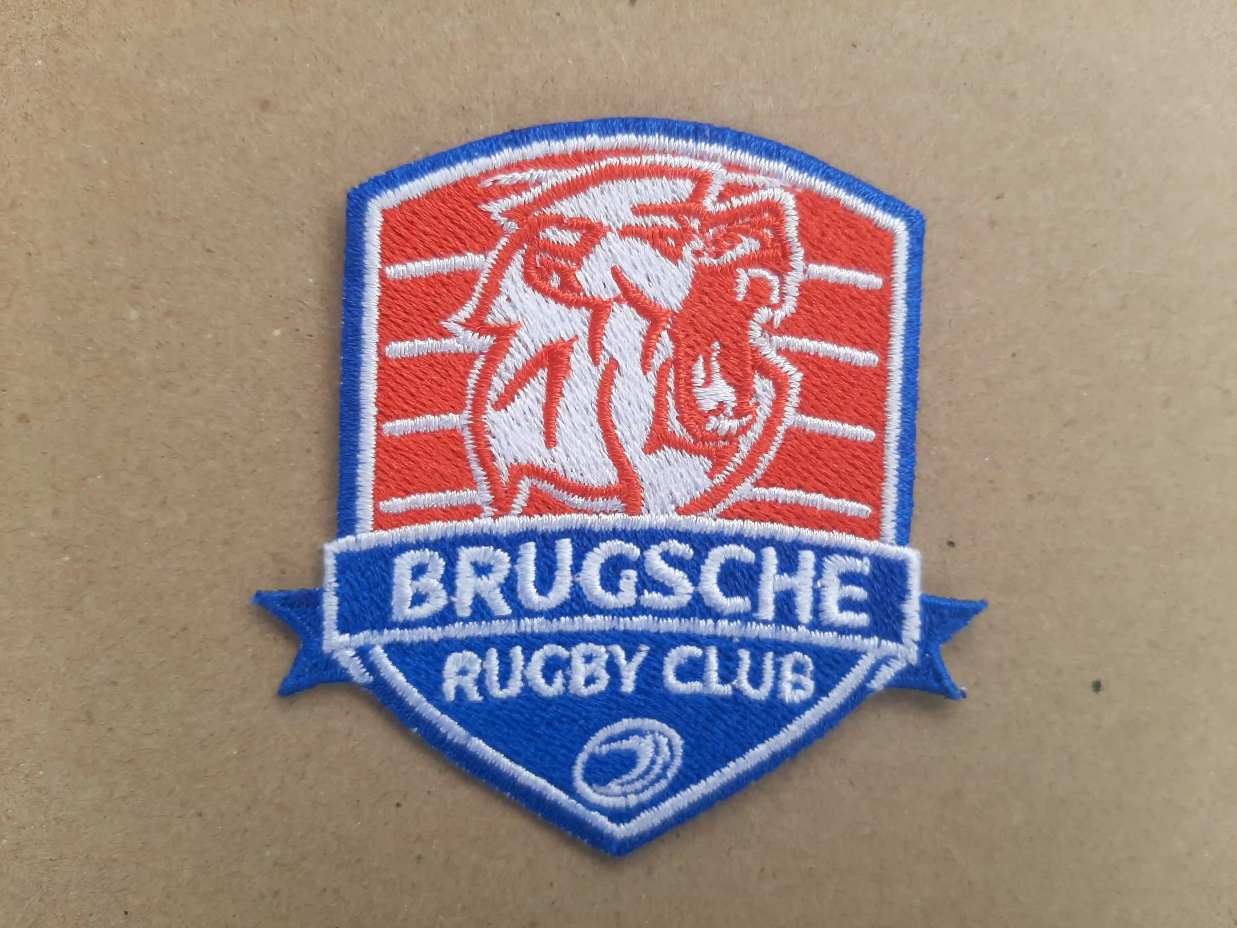 Rugby Clubs wear the logo proudly on Jerseys, Bags, Jackets and Hats.  Enhance your club with Crisp Tiny Text Details Brugsche Rugby Club Sports_Rugby